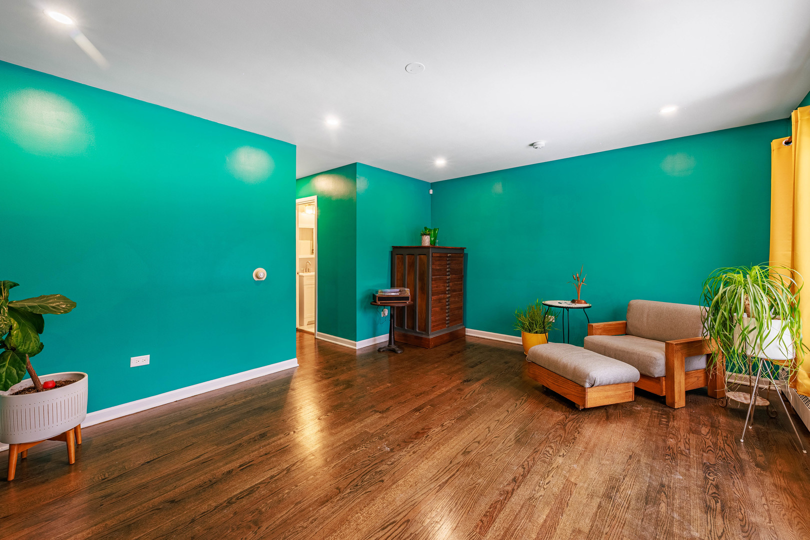 3702 West George Street Chicago, IL 60618 - Photo 4 of 20 a living room with furniture and a flat screen tv
