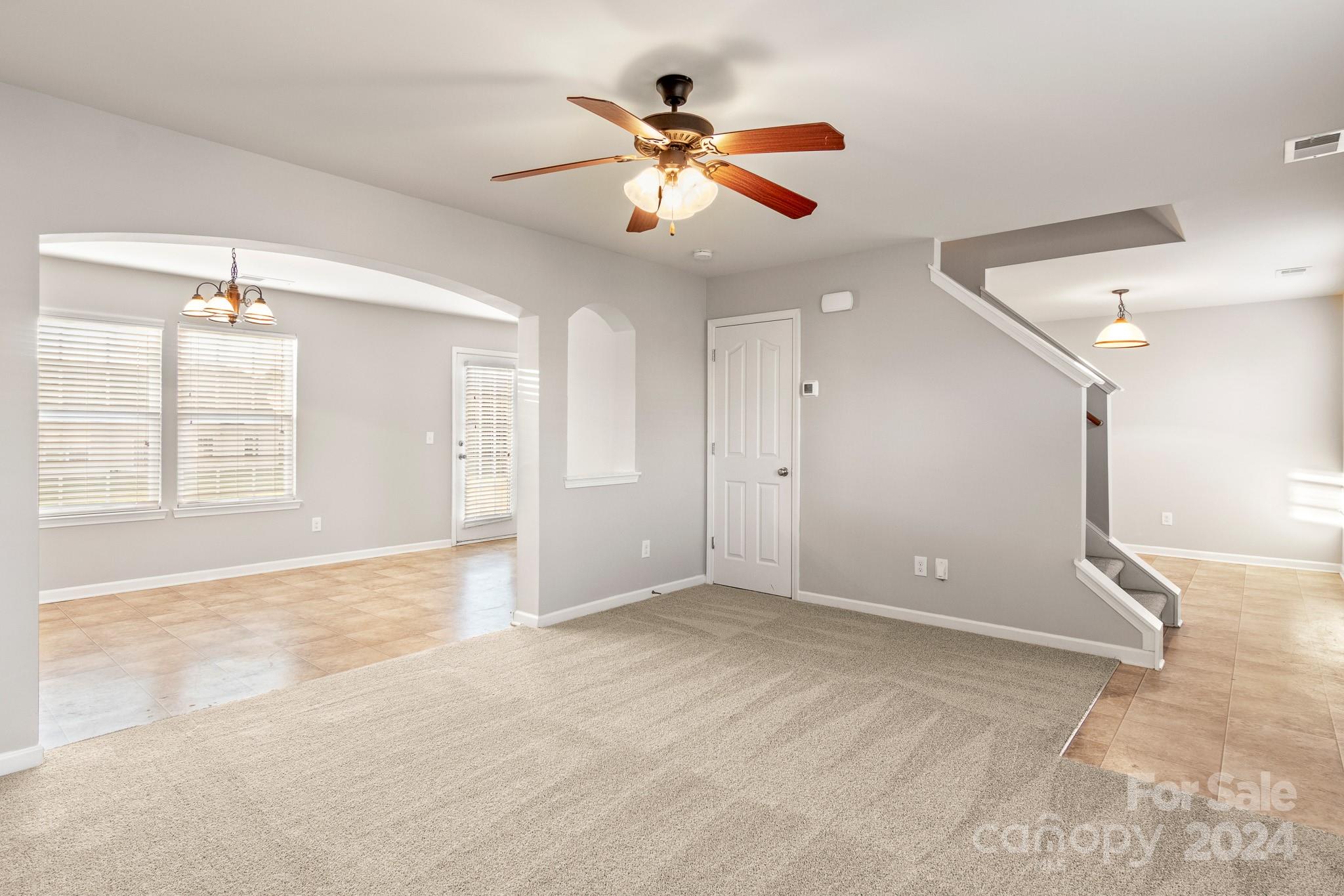 4071 Clover Road Northwest Concord, NC 28027 - Photo 11 of 43 wooden floor in an empty room with a window