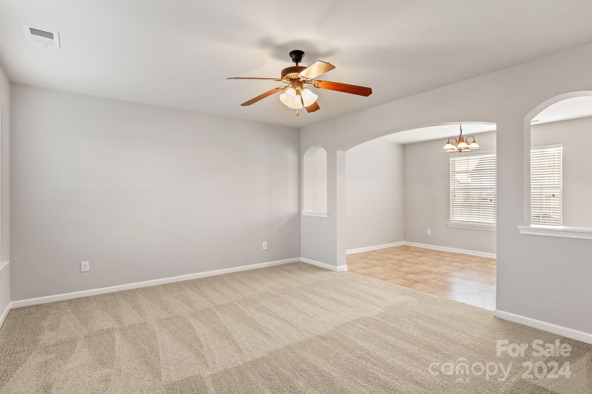 4071 Clover Road Northwest Concord, NC 28027 - Photo 12 of 43 a view of an empty room with a window