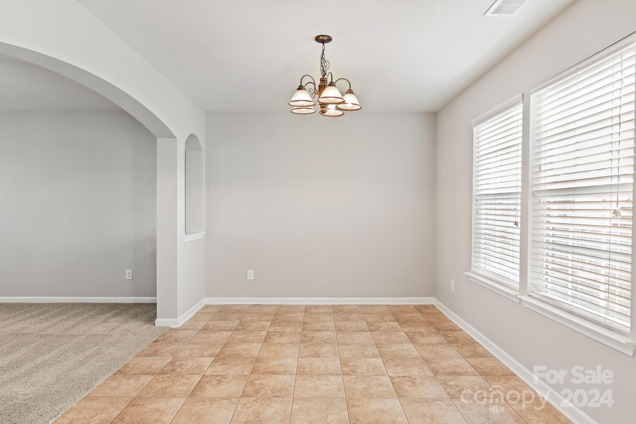 4071 Clover Road Northwest Concord, NC 28027 - Photo 18 of 43 a view of an empty room with a window