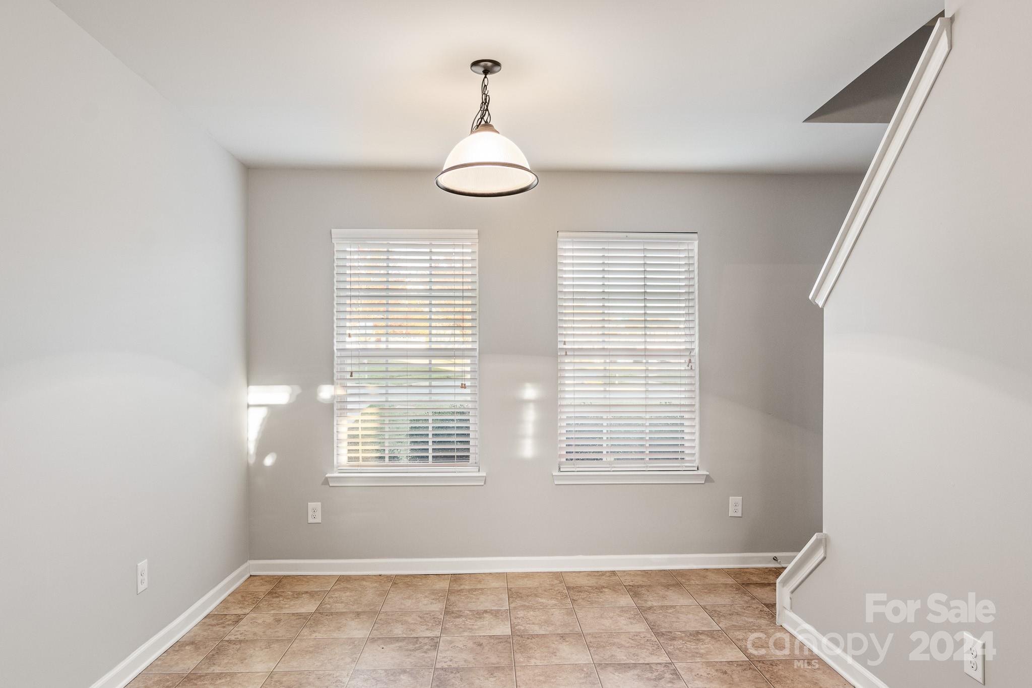 4071 Clover Road Northwest Concord, NC 28027 - Photo 22 of 43 a view of an empty room with a window