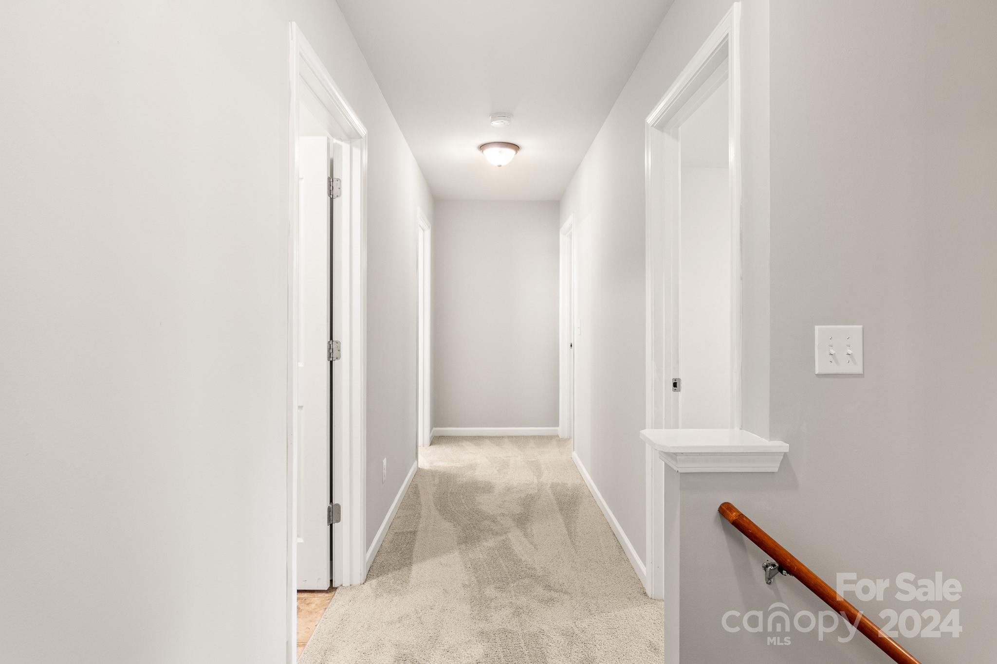 4071 Clover Road Northwest Concord, NC 28027 - Photo 25 of 43 a view of a hallway with wooden floor