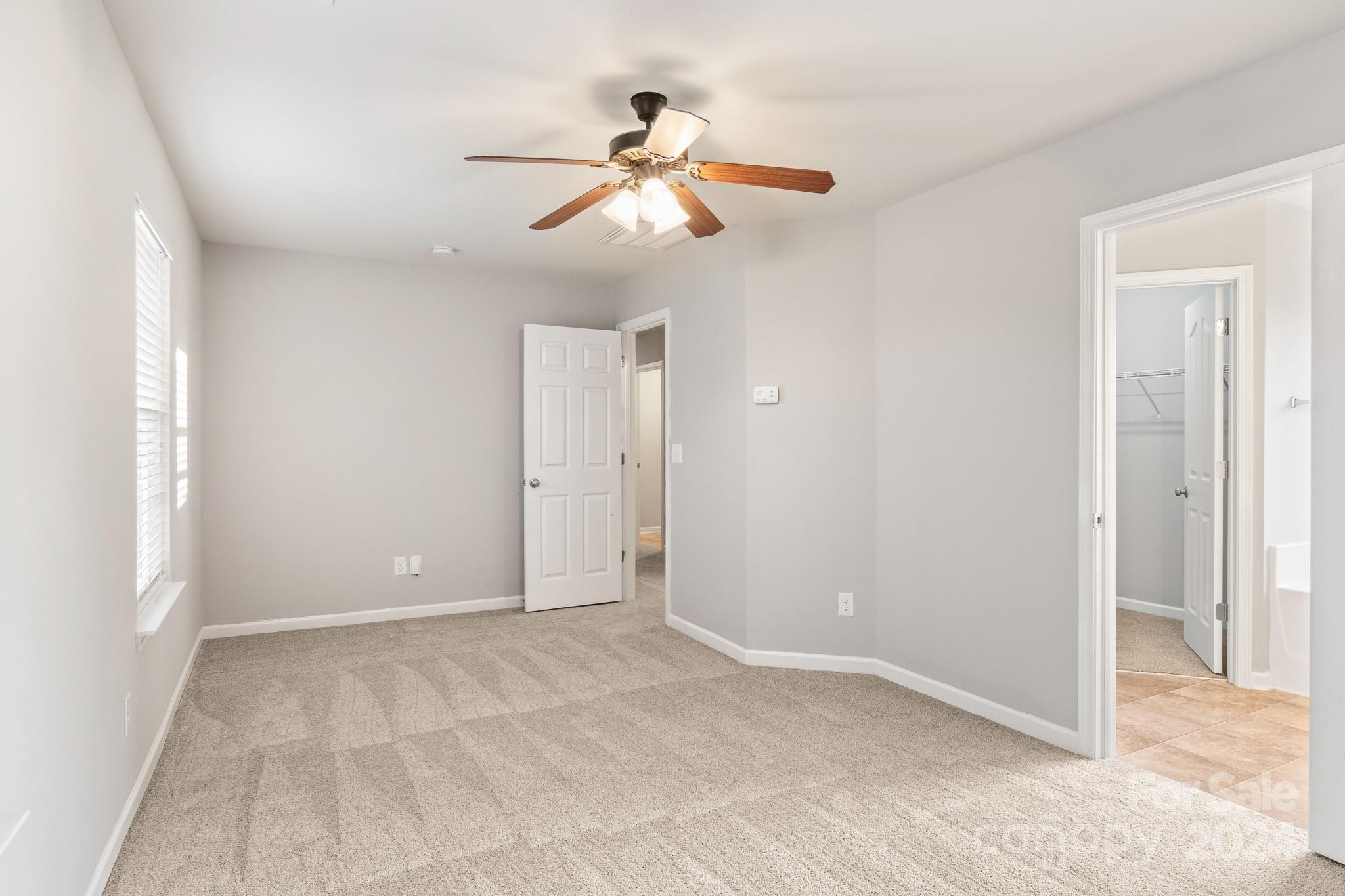 4071 Clover Road Northwest Concord, NC 28027 - Photo 29 of 43 a view of an empty room with a window