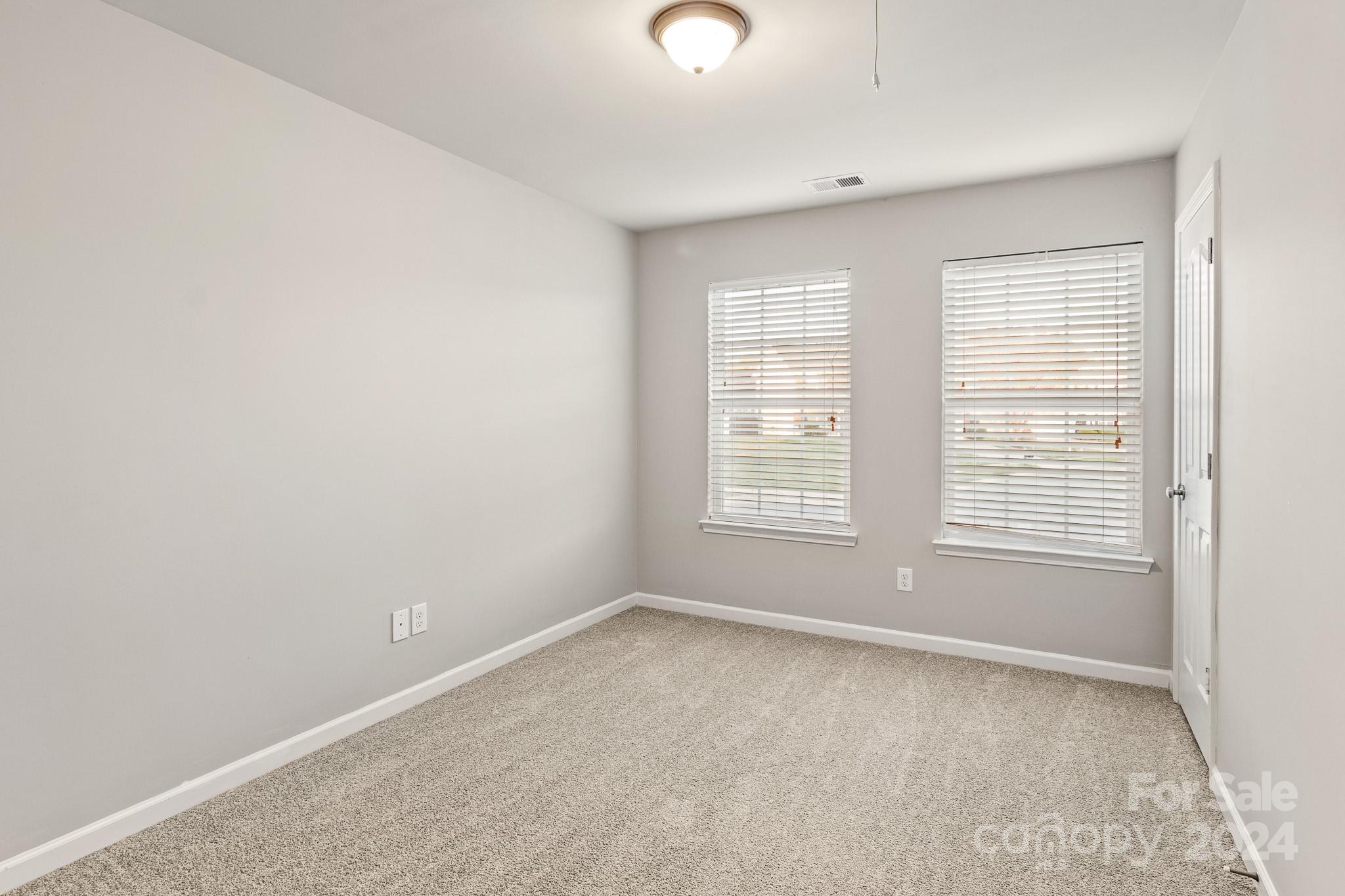 4071 Clover Road Northwest Concord, NC 28027 - Photo 33 of 43 an empty room with a window