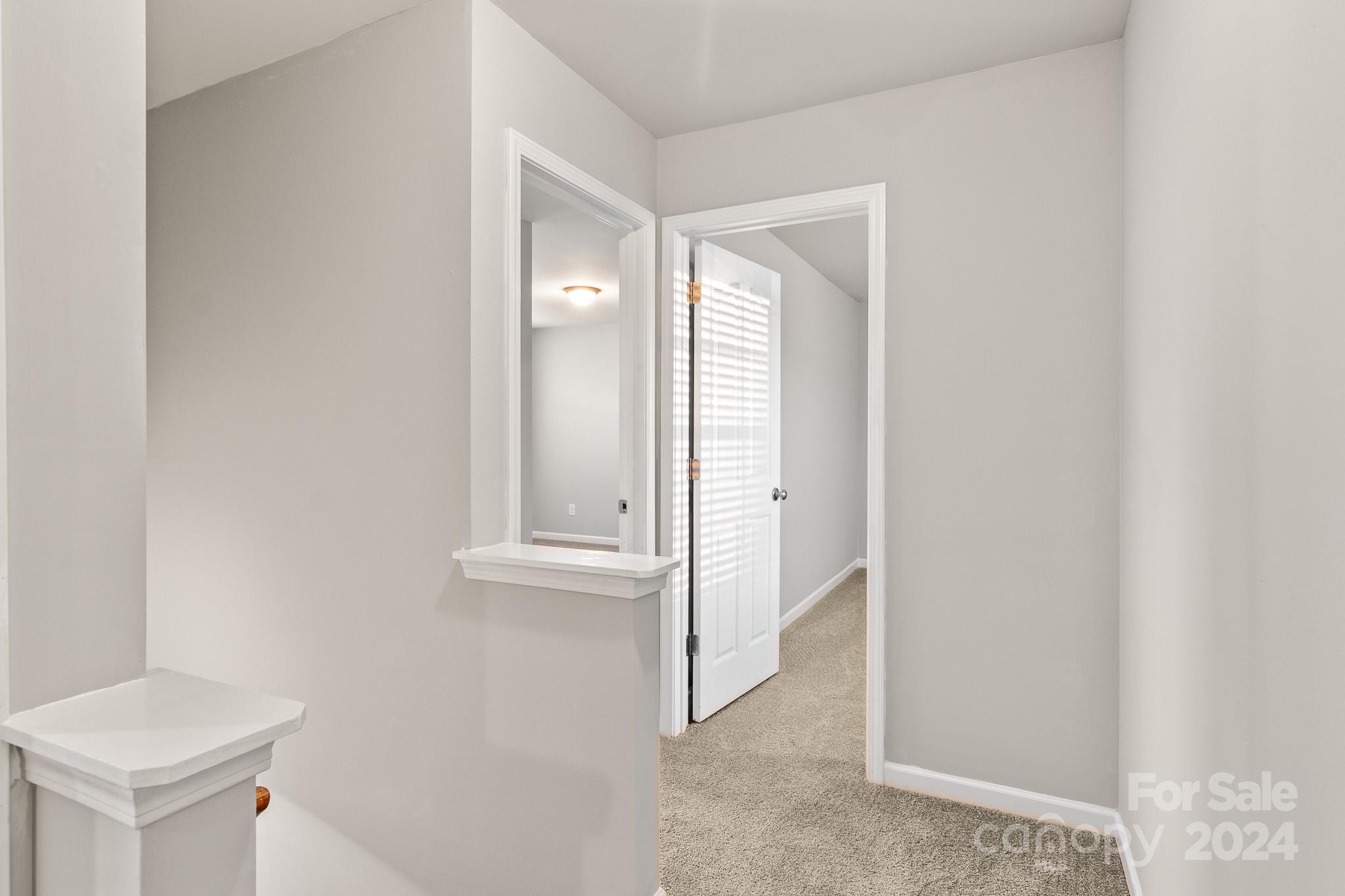 4071 Clover Road Northwest Concord, NC 28027 - Photo 38 of 43 an entryway with wooden floor and cabinet