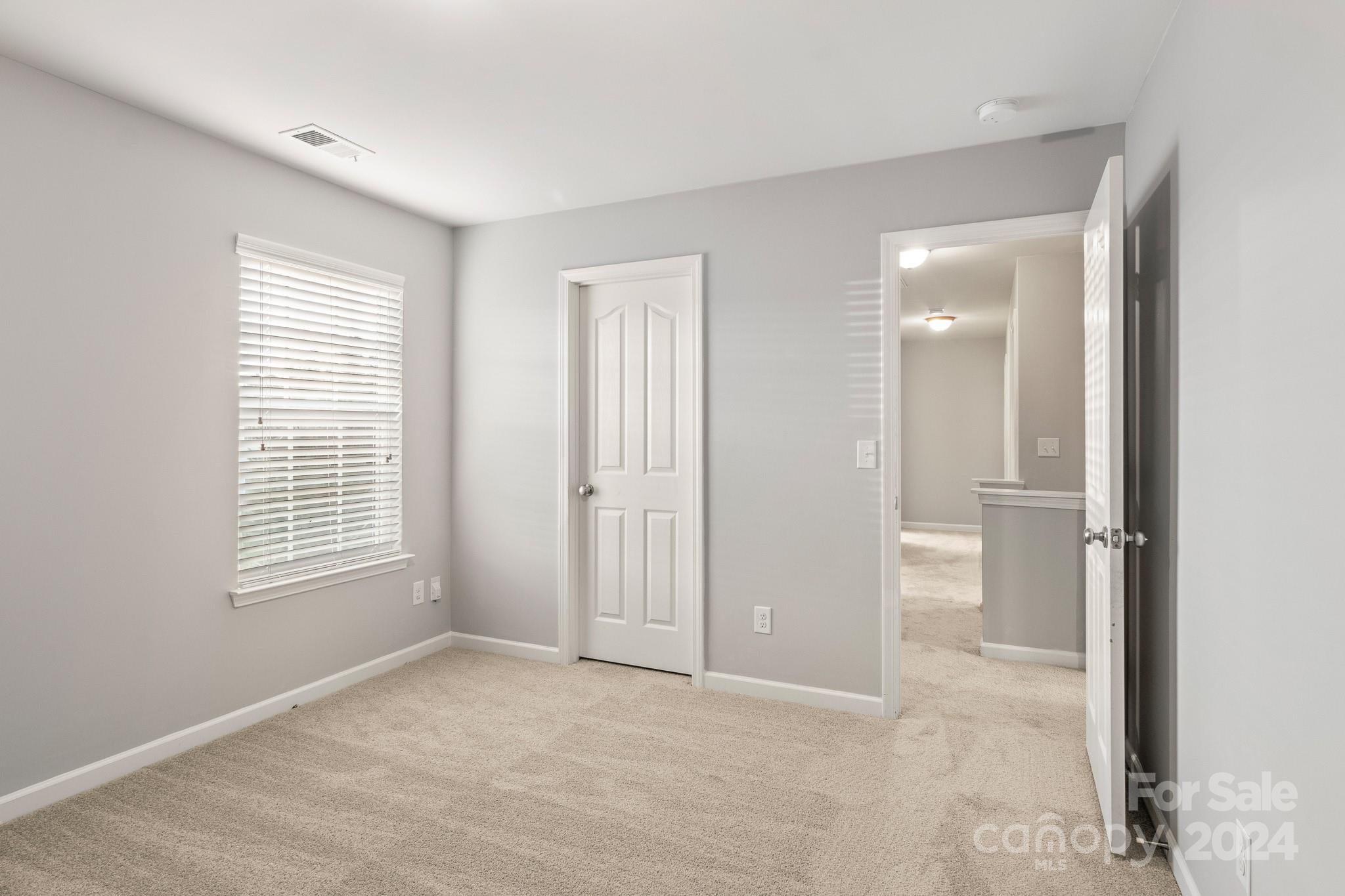 4071 Clover Road Northwest Concord, NC 28027 - Photo 41 of 43 a view of an empty room with a window
