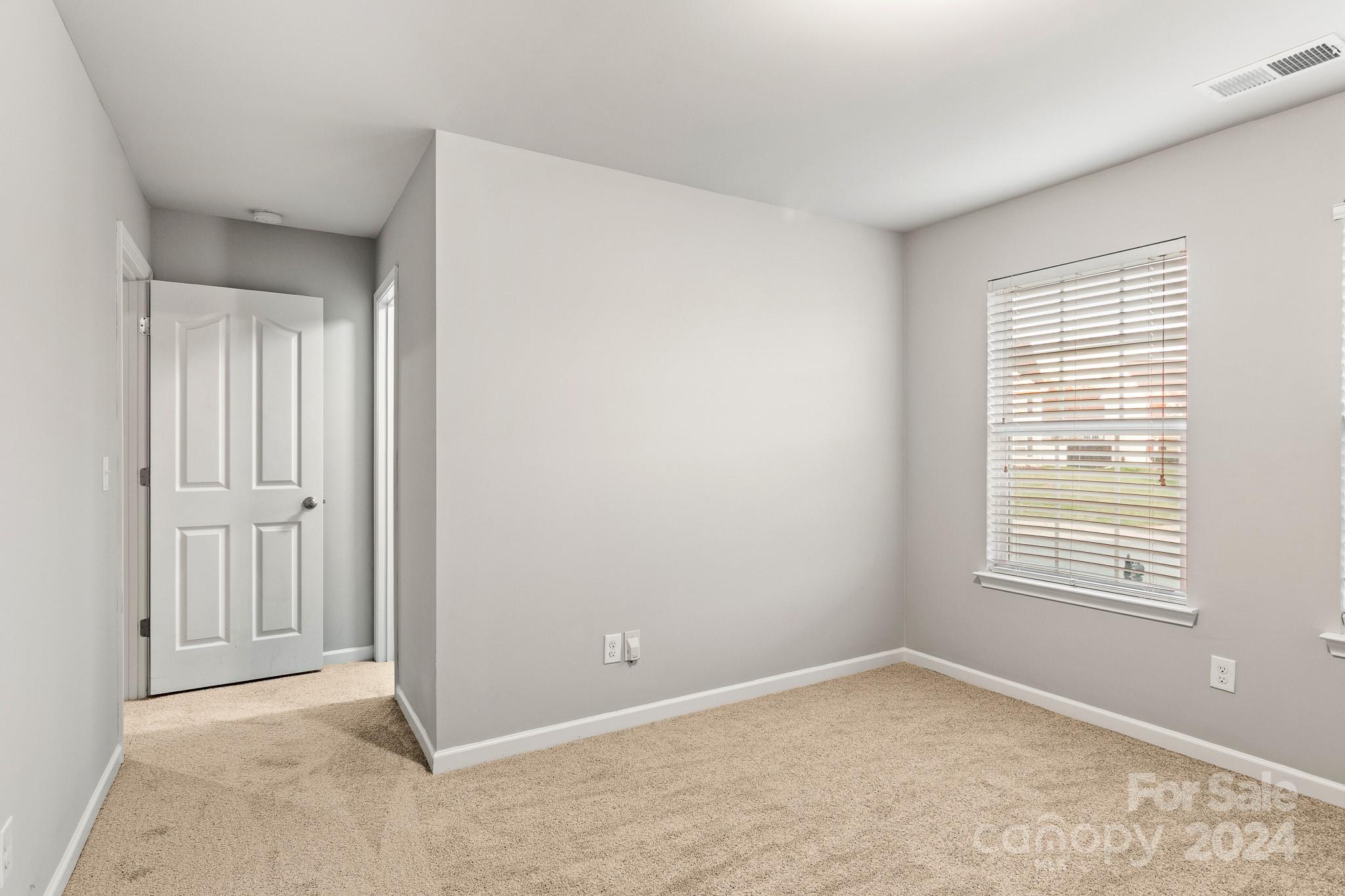 4071 Clover Road Northwest Concord, NC 28027 - Photo 43 of 43 a view of an empty room with a window