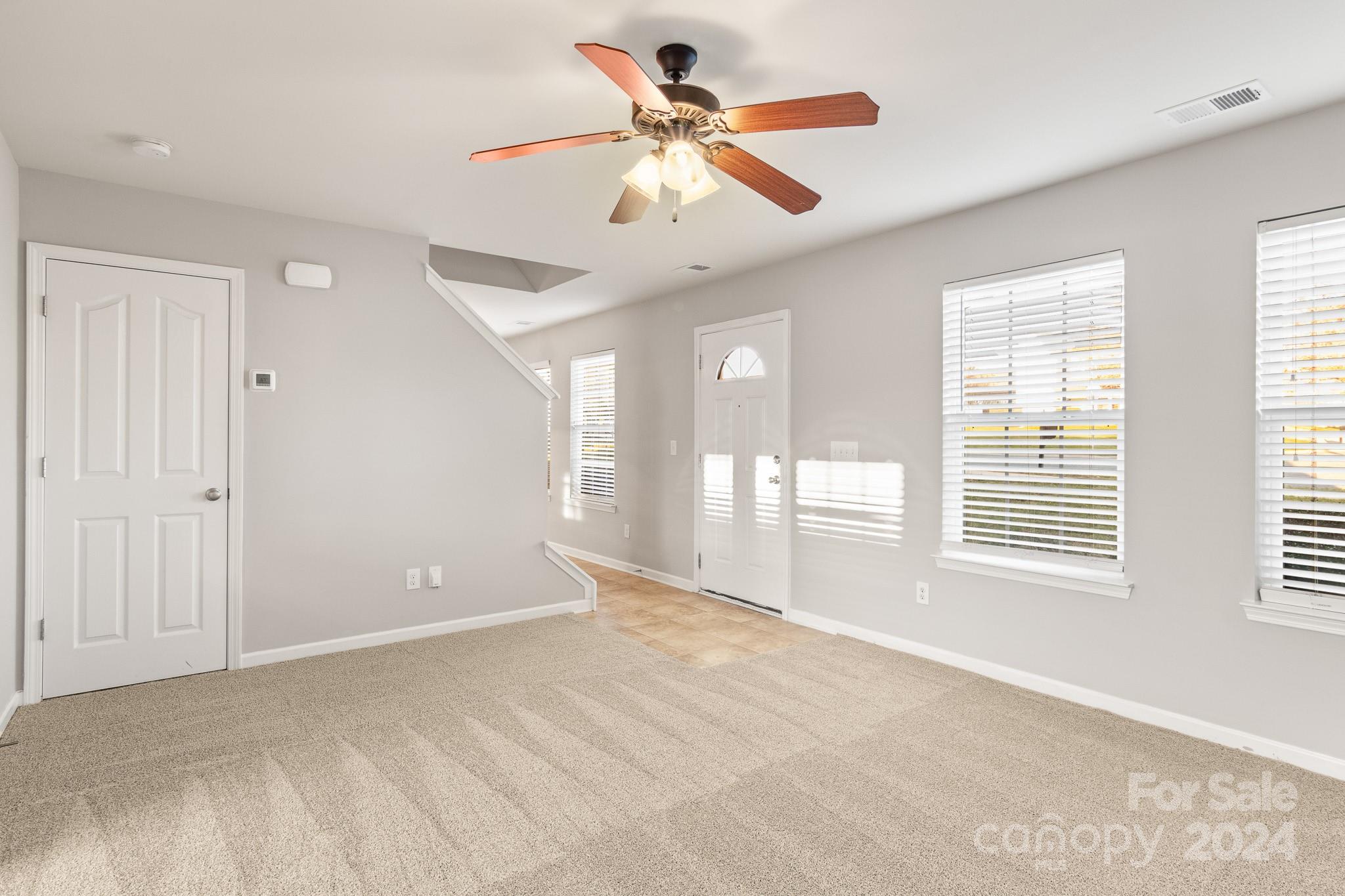 4071 Clover Road Northwest Concord, NC 28027 - Photo 8 of 43 a view of an empty room with a window