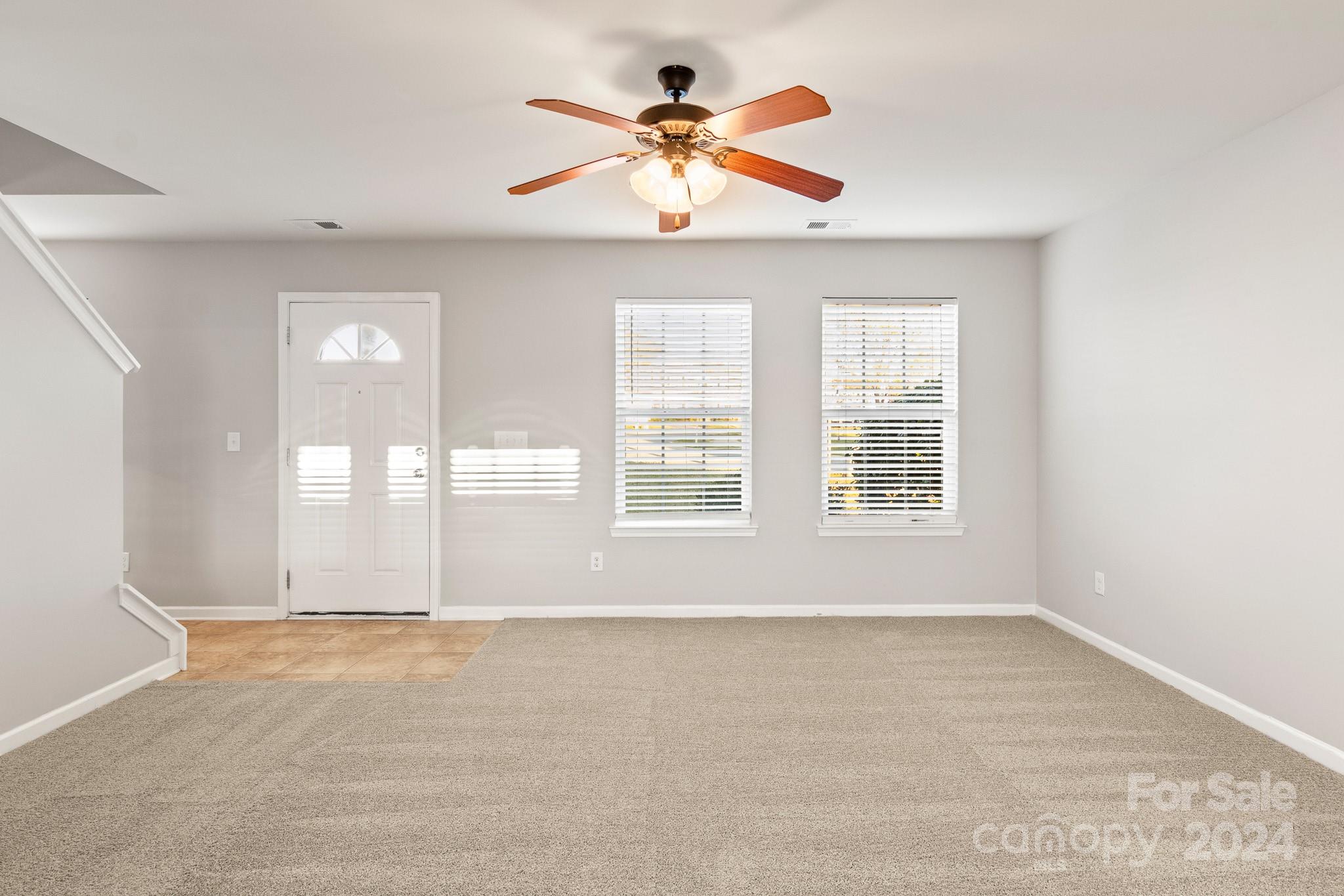 4071 Clover Road Northwest Concord, NC 28027 - Photo 9 of 43 a view of an empty room with a window