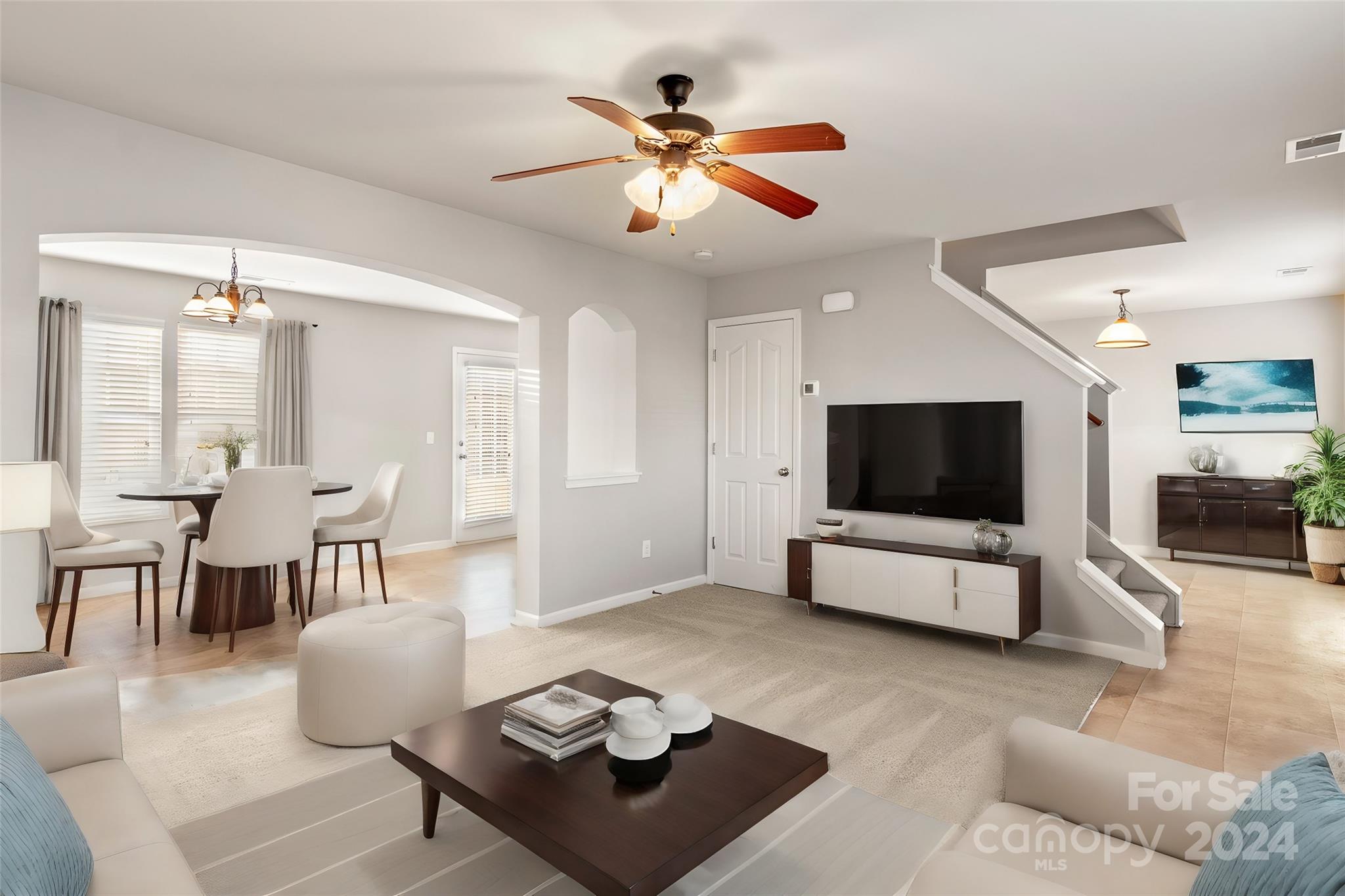 4071 Clover Road Northwest Concord, NC 28027 - Photo 10 of 43 a living room with furniture and a flat screen tv