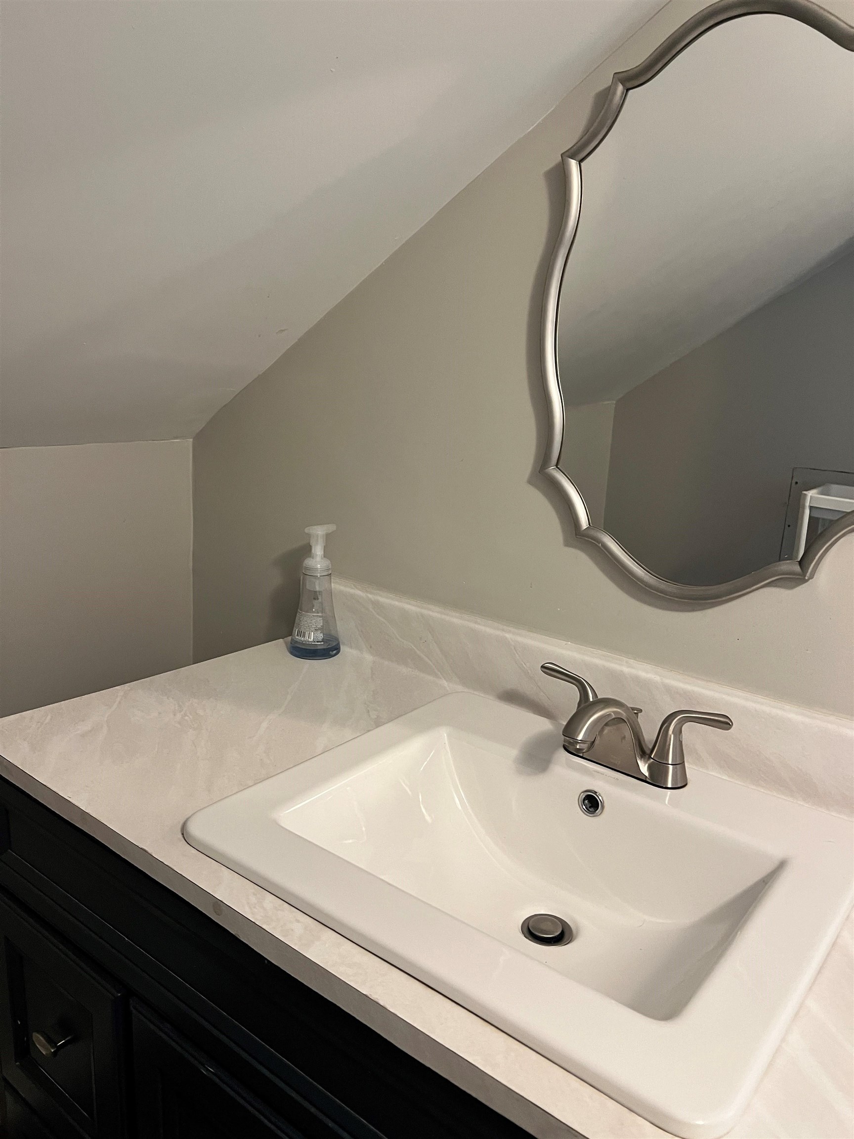 549 South Rowlett Street Collierville, TN 38017 - Photo 14 of 27 a bathroom with a sink and mirror