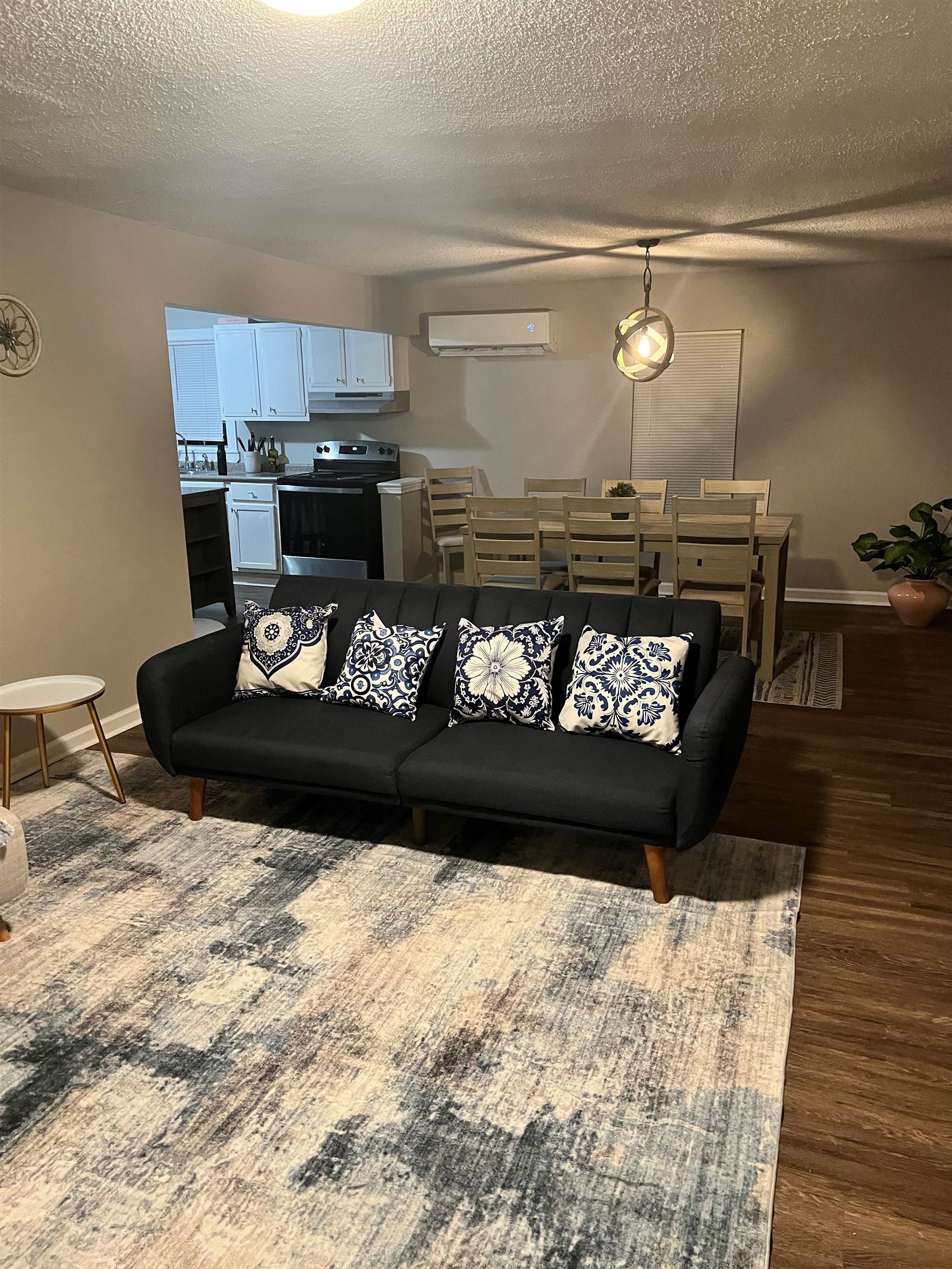 549 South Rowlett Street Collierville, TN 38017 - Photo 2 of 27 a kitchen with a sink and a stove