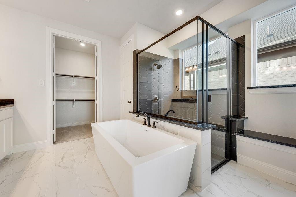 1329 Sundance Lane Justin, TX 76247 - Photo 20 of 37 a bathroom with a sink and a mirror