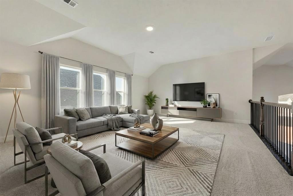 1329 Sundance Lane Justin, TX 76247 - Photo 26 of 37 a living room with furniture and a flat screen tv