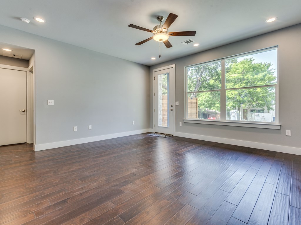 406 Post Rd Drive, Unit 1 Austin, TX 78704 - Photo 4 of 30 Bright view of the living area with it's large windows