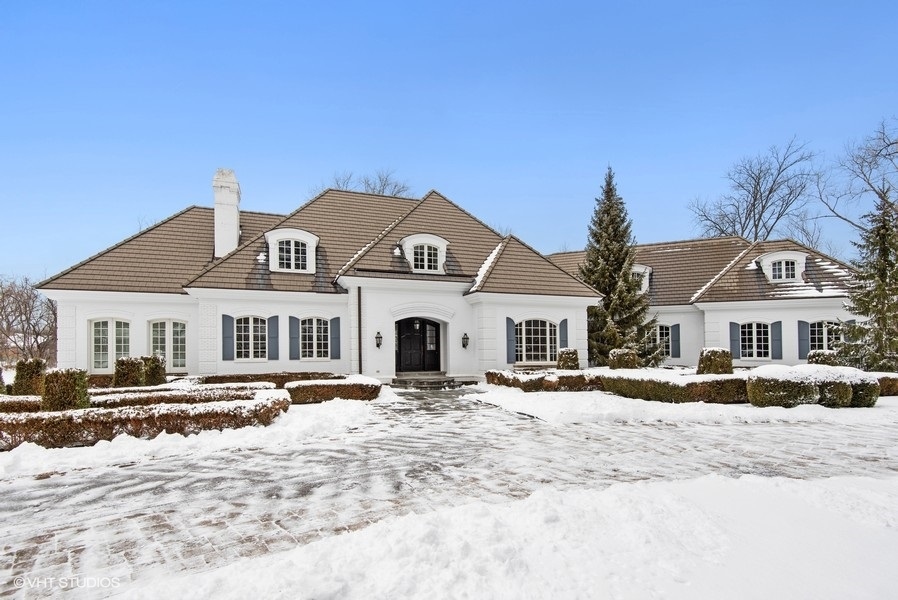 245 Maple Row Northfield, IL 60093 - Photo 1 of 1 a front view of a house with a yard
