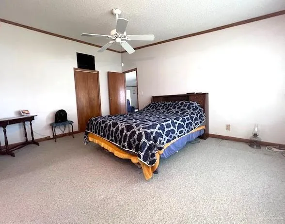 a large bed sitting in a room