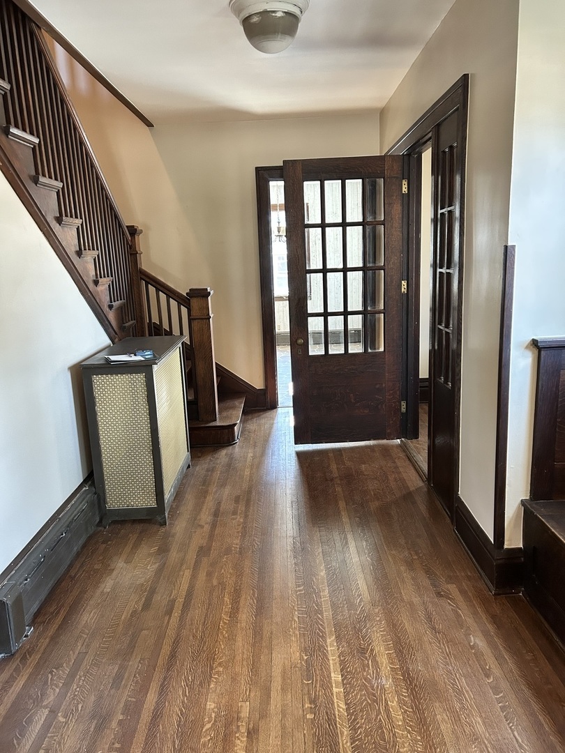 200 East Dakota Street Spring Valley, IL 61362 - Photo 11 of 23 a view of a hallway with wooden floor and staircase