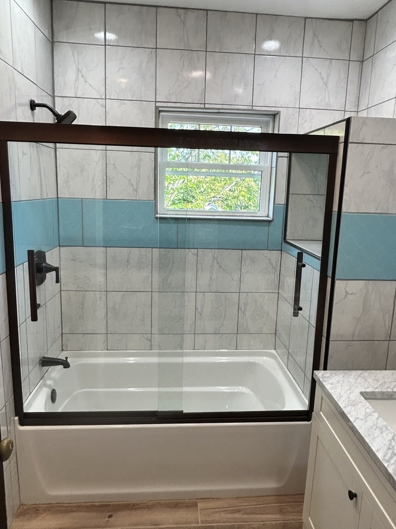 200 East Dakota Street Spring Valley, IL 61362 - Photo 20 of 23 a bathroom with a bathtub and shower