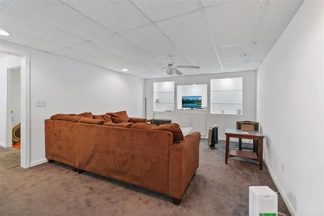 a kitchen with a sink cabinets and refrigerator