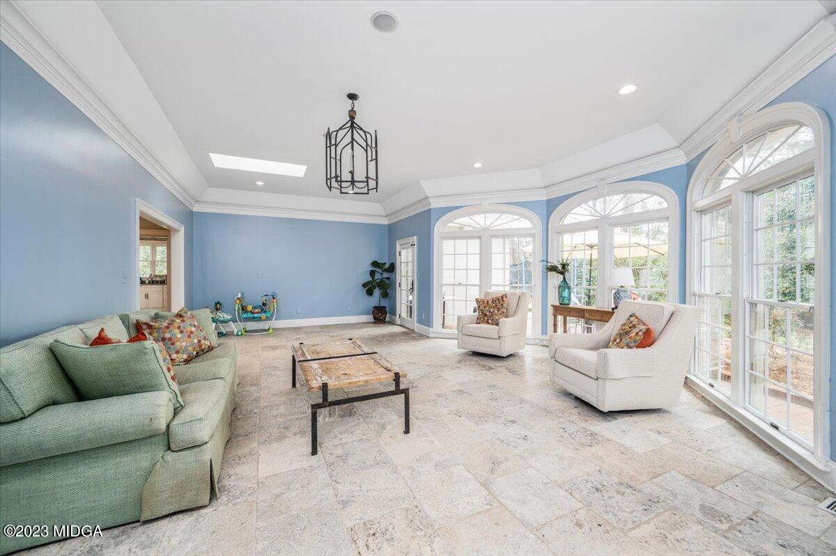 4163 Canyon Road Macon, GA 31210 - Photo 11 of 20 a living room with furniture and a large window