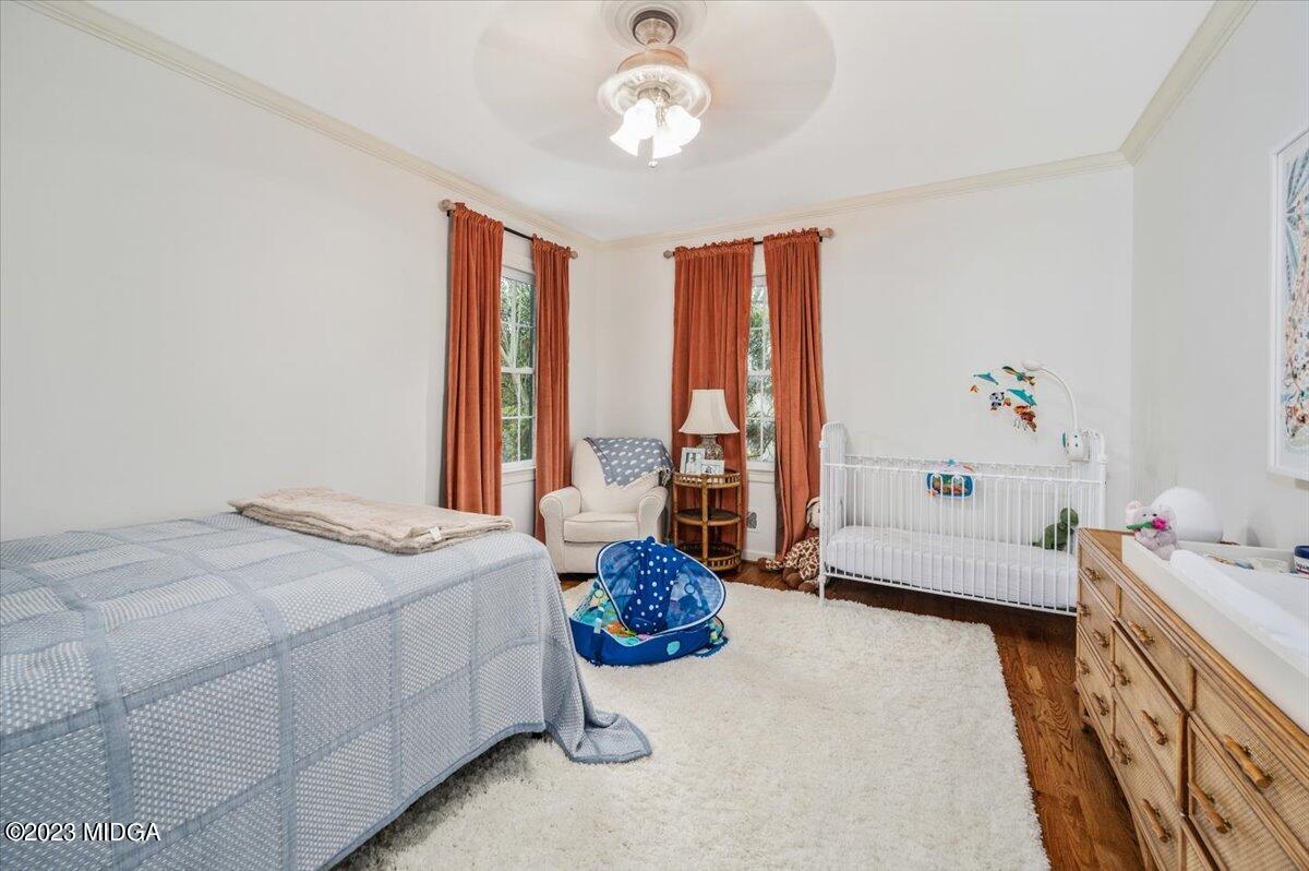 4163 Canyon Road Macon, GA 31210 - Photo 16 of 20 a bedroom with a bed and a window