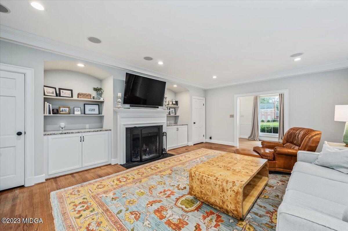 4163 Canyon Road Macon, GA 31210 - Photo 8 of 20 a spacious bedroom with a bed and a flat screen tv