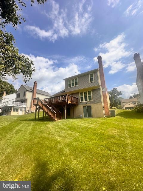 8805 Admiral Drive Laurel, MD 20708 - Photo 2 of 3 a view of a house with a yard