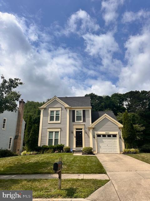 8805 Admiral Drive Laurel, MD 20708 - Photo 3 of 3 a front view of a house with a yard