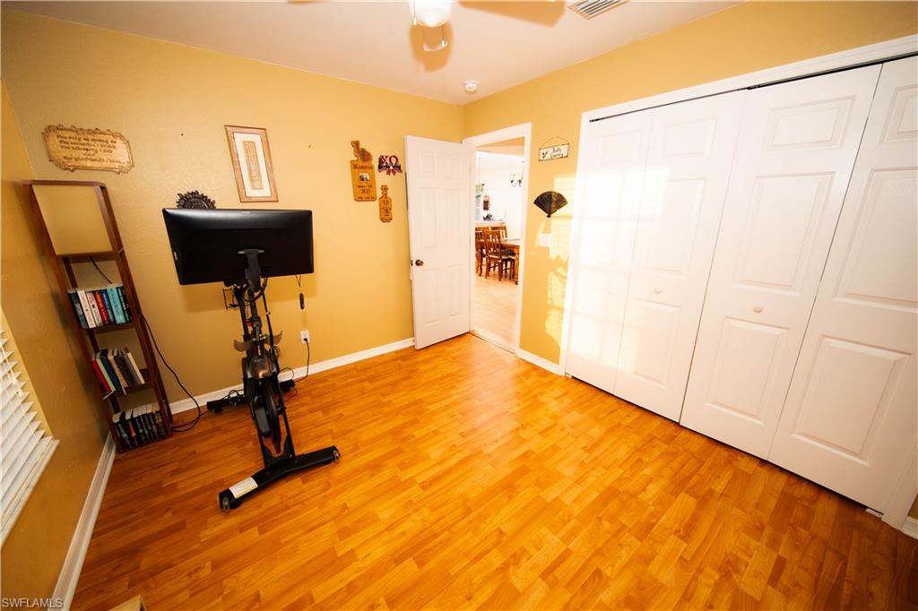 18561 Sunflower Road Fort Myers, FL 33967 - Photo 7 of 10 a view of a room with gym equipment