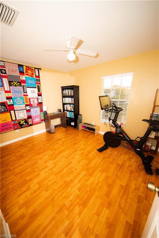 18561 Sunflower Road Fort Myers, FL 33967 - Photo 8 of 10 a view of a room with gym equipment