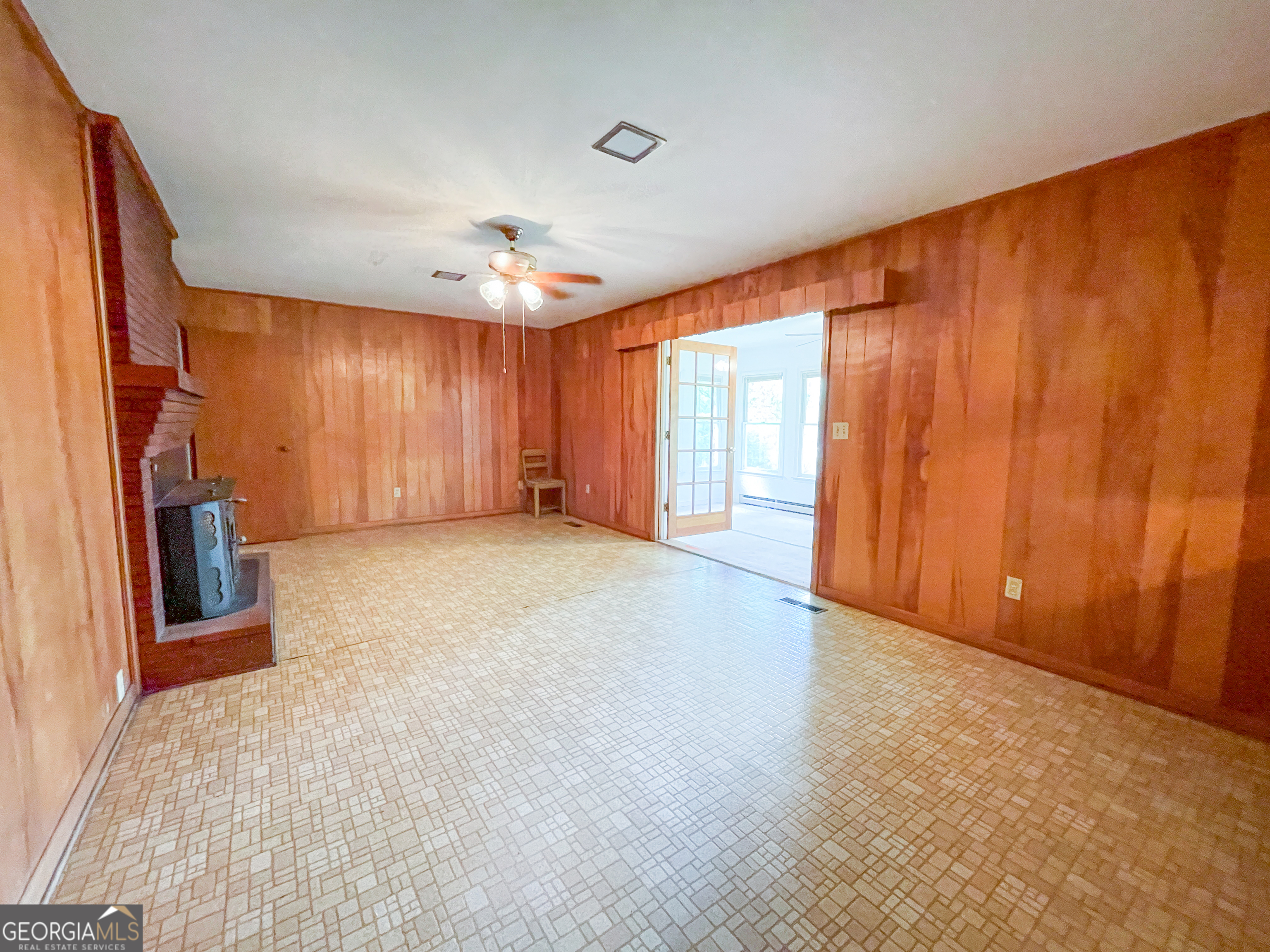7517 Blacks Bluff Road Southwest Cave Spring, GA 30124 - Photo 27 of 57 a view of a livingroom with a staircase