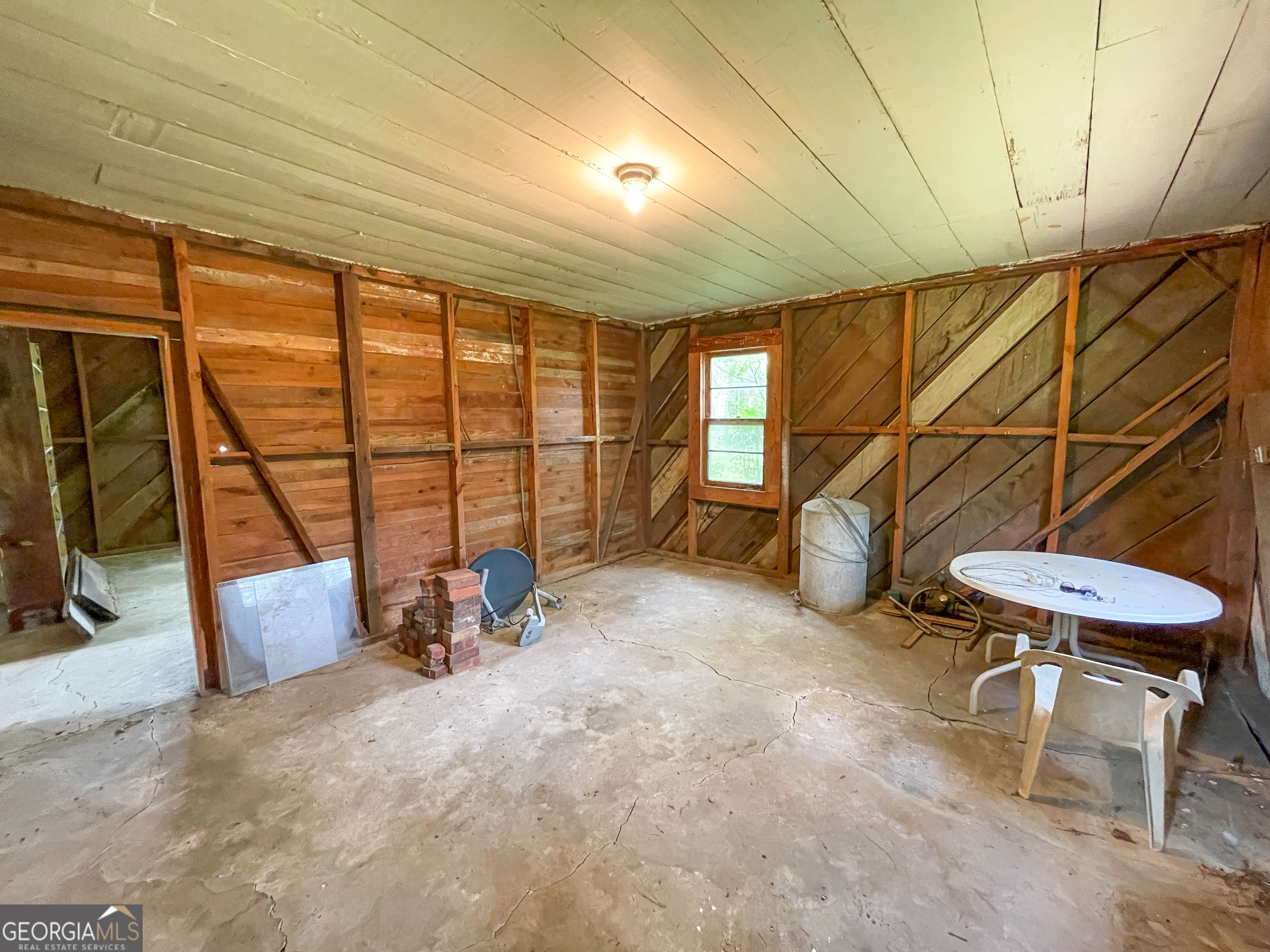 7517 Blacks Bluff Road Southwest Cave Spring, GA 30124 - Photo 45 of 57 a view of a room with gym equipment