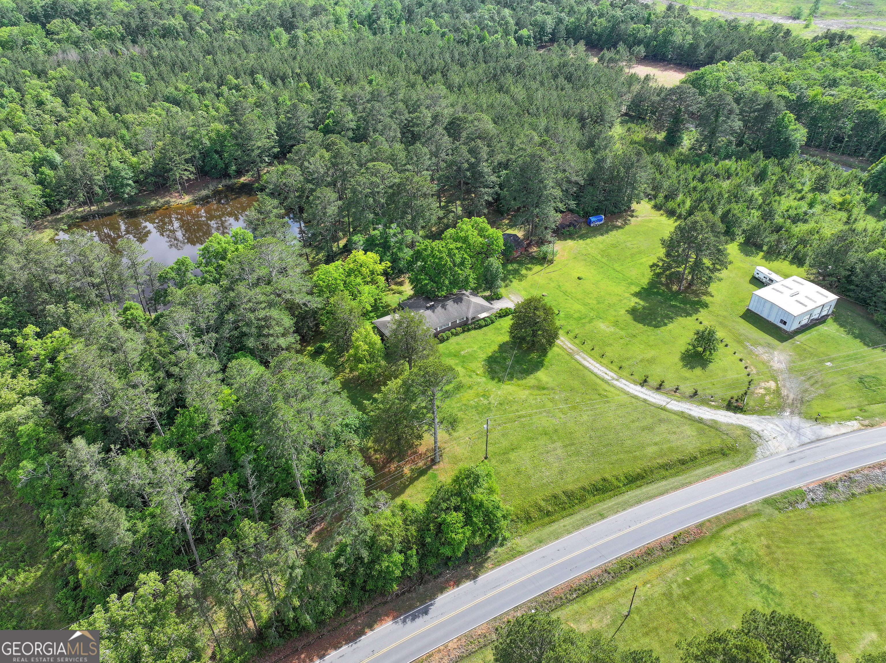 7517 Blacks Bluff Road Southwest Cave Spring, GA 30124 - Photo 49 of 57 an aerial view of a yard