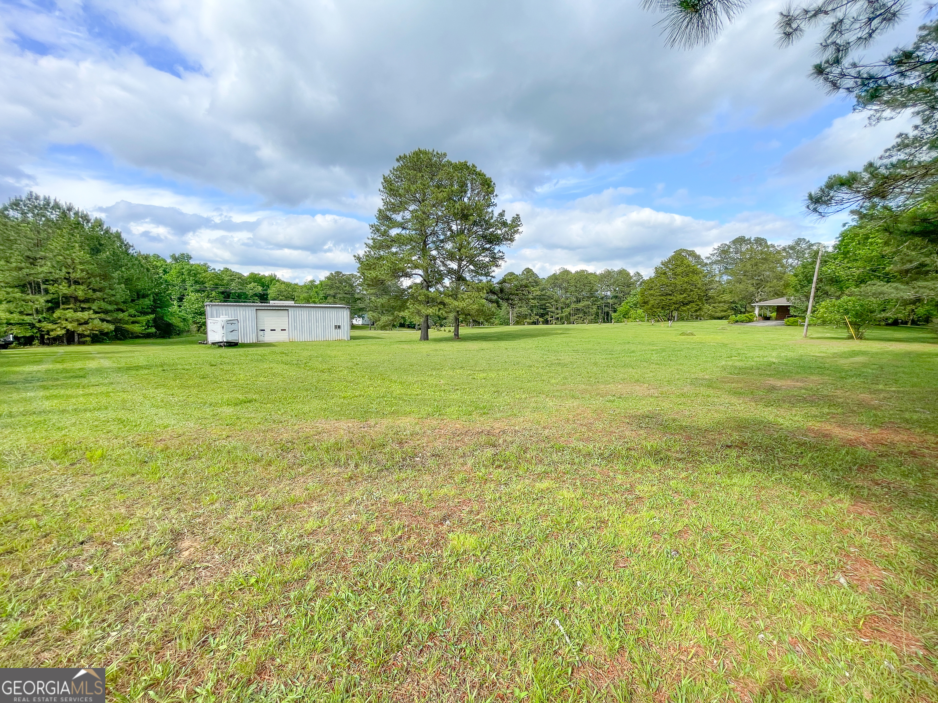 7517 Blacks Bluff Road Southwest Cave Spring, GA 30124 - Photo 51 of 57 a big yard with lots of green space