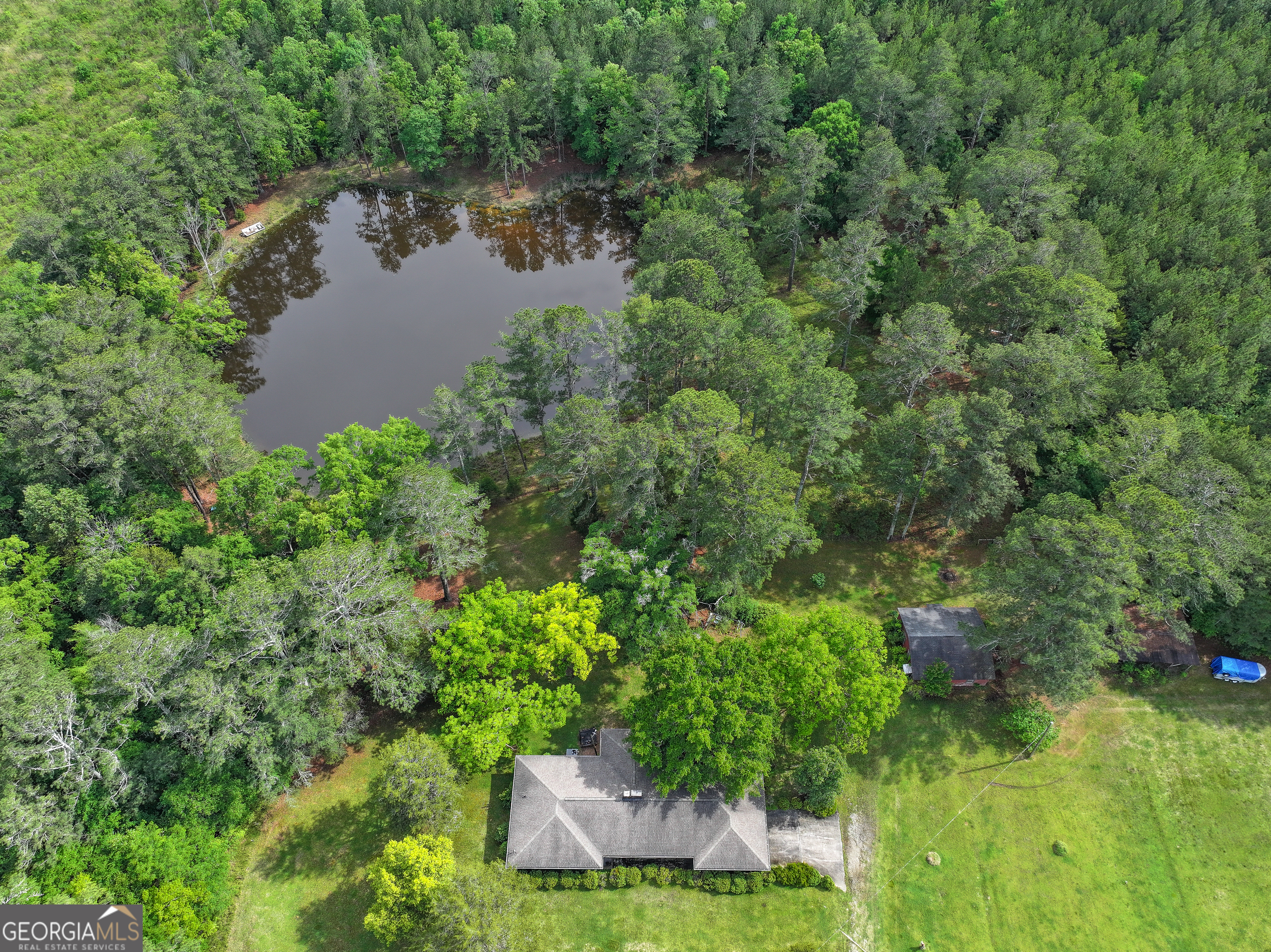 7517 Blacks Bluff Road Southwest Cave Spring, GA 30124 - Photo 53 of 57 a view of a garden from a lake view