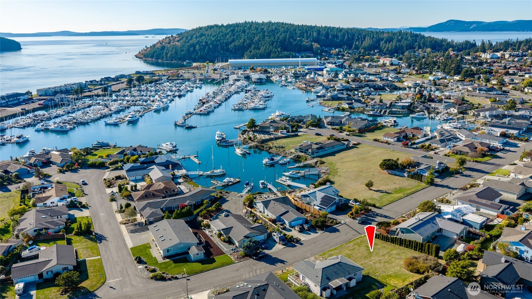 5202 Doon Way Anacortes, WA 98221 - Photo 3 of 7 an aerial view of residential houses and outdoor space