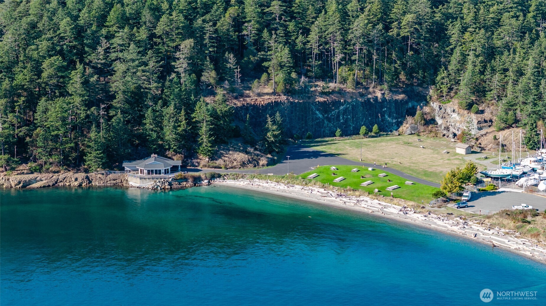 5202 Doon Way Anacortes, WA 98221 - Photo 7 of 7 a swimming pool with outdoor seating and yard
