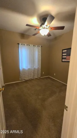 en empty room with a empty space and a window