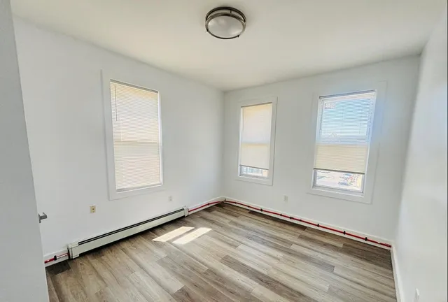 an empty room with windows