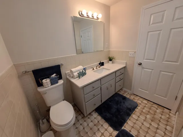 a bathroom with a bathtub and shower