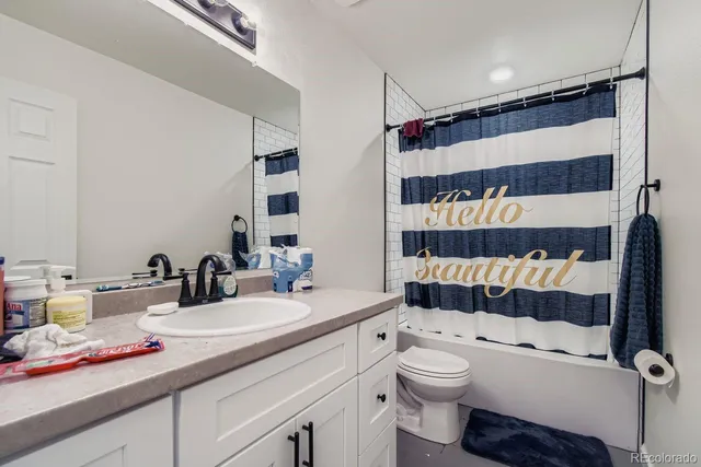 a bedroom with a bed and a closet