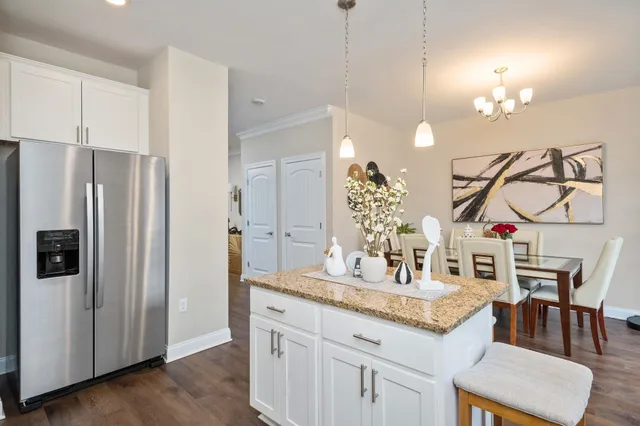 a bathroom with a sink a mirror and a shower
