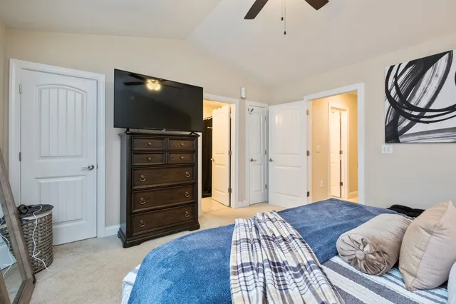 a bedroom with a bed and furniture