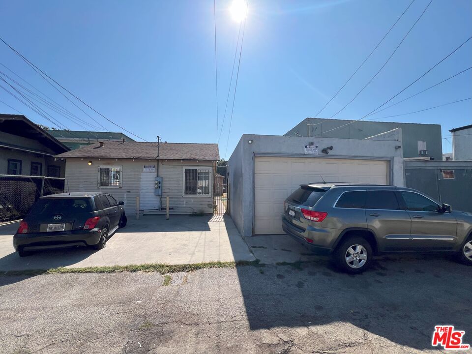 737 Lime Avenue Long Beach, CA 90813 - Photo 17 of 19 a car parked in front of a house