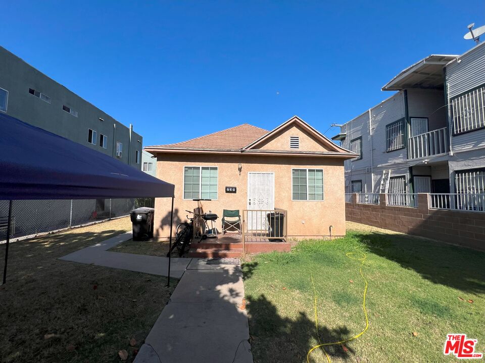 737 Lime Avenue Long Beach, CA 90813 - Photo 2 of 19 a front view of a house with garden