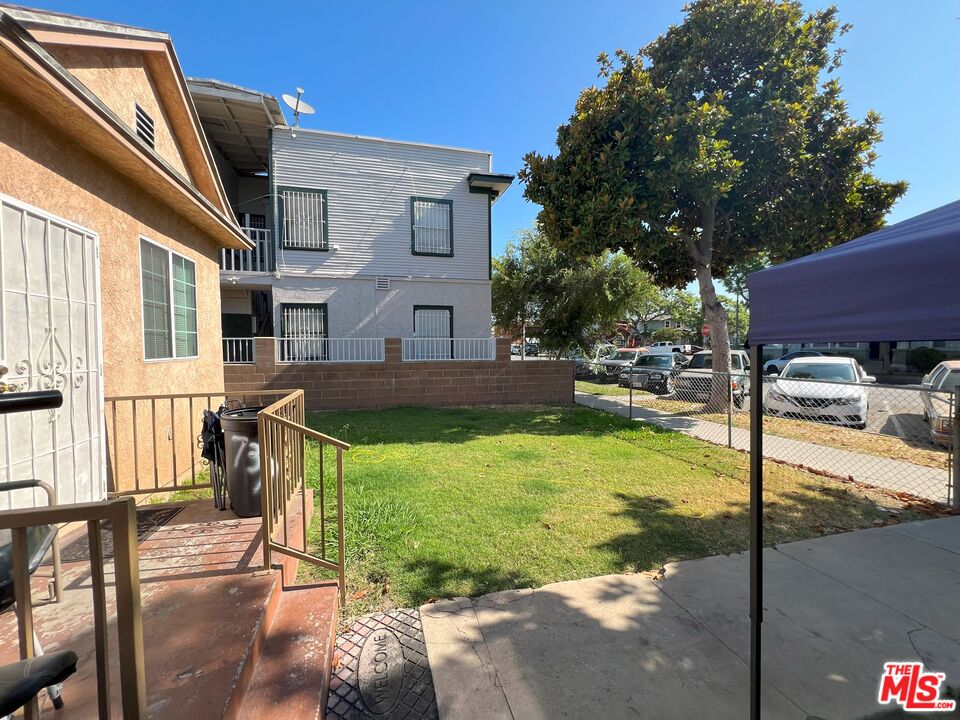 737 Lime Avenue Long Beach, CA 90813 - Photo 3 of 19 a view of an house with backyard porch and furniture