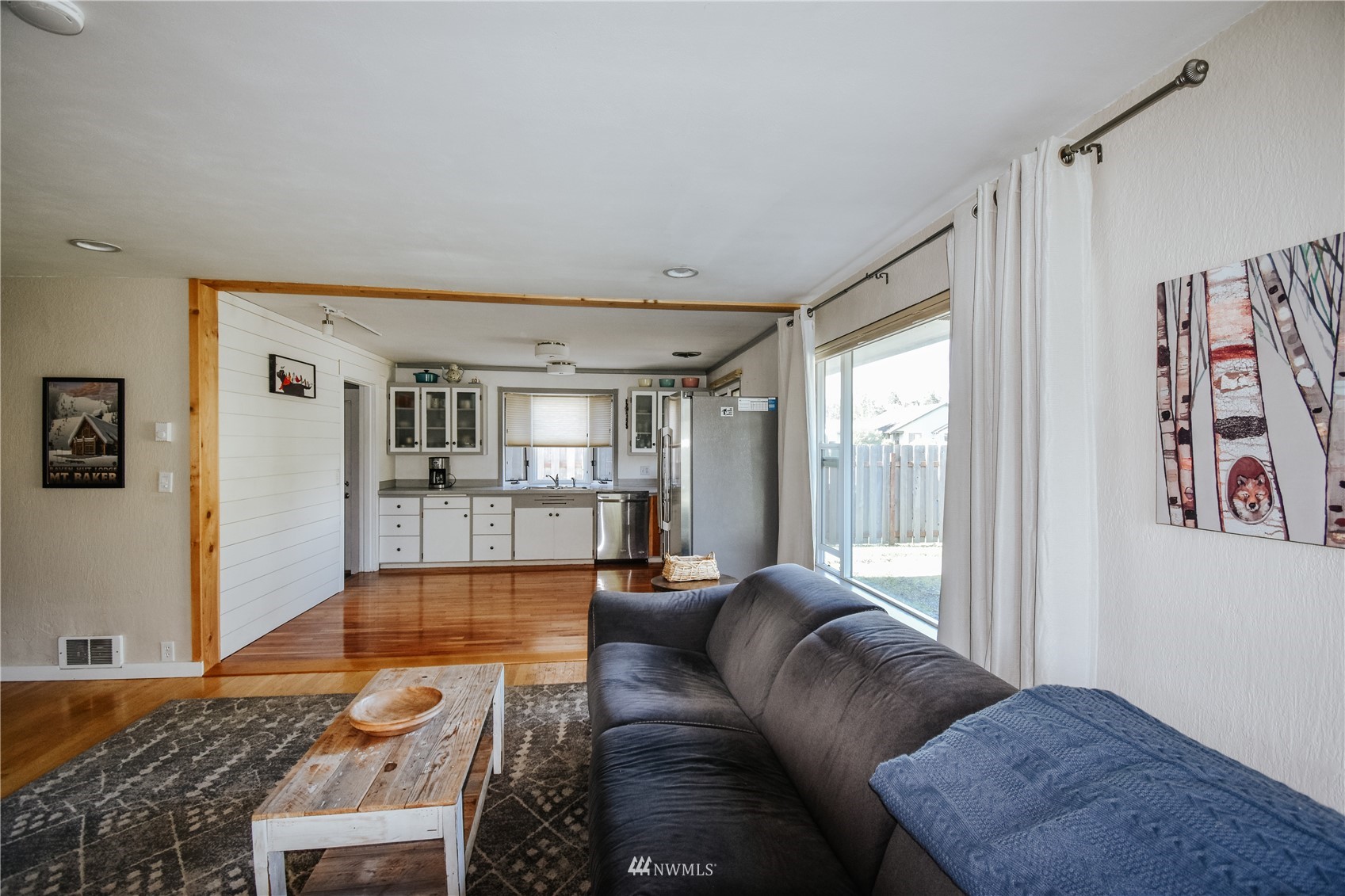 1375 West Smith Road Ferndale, WA 98248 - Photo 11 of 19 a living room with furniture and a rug