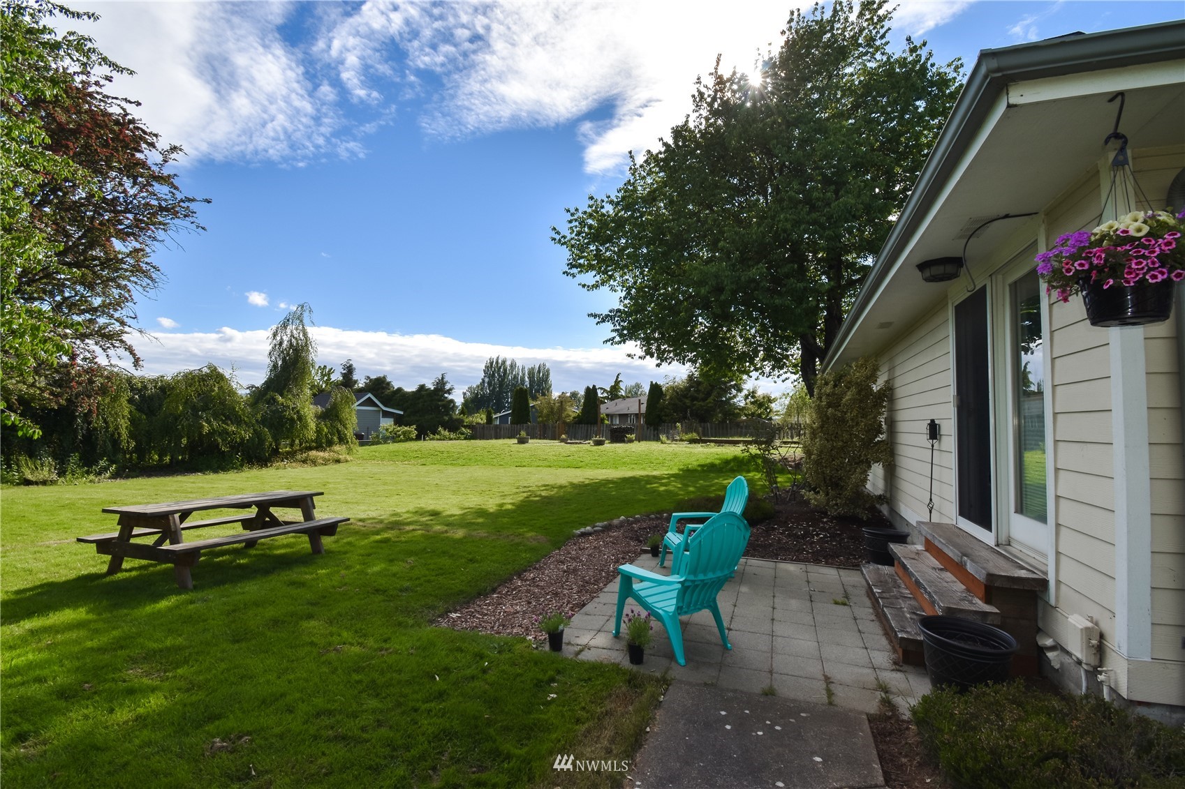 1375 West Smith Road Ferndale, WA 98248 - Photo 3 of 19 a view of a park with plants and a bench
