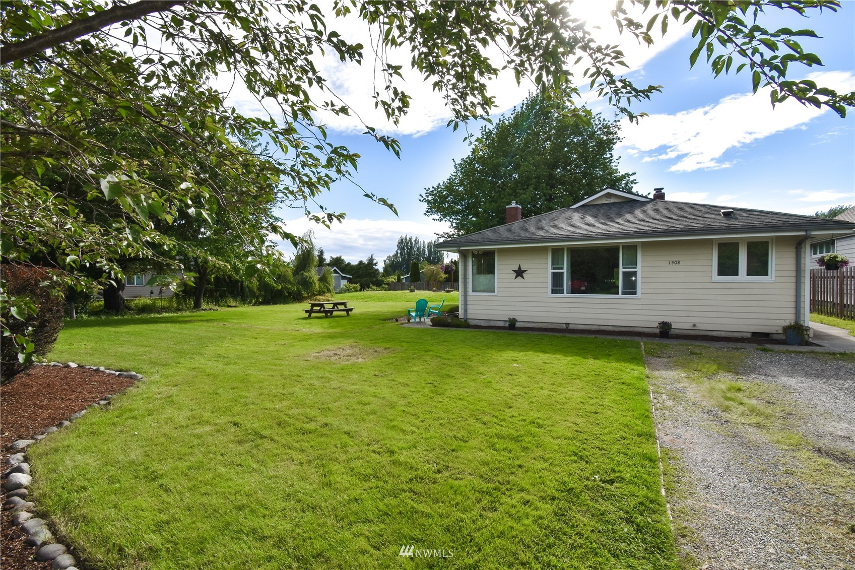 1375 West Smith Road Ferndale, WA 98248 - Photo 4 of 19 a view of a house with a backyard